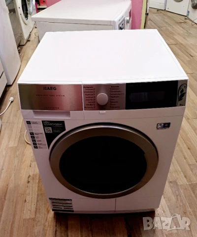 Кондензна сушилня с термопомпа  AEG  ABSOLUTE CARE SYSTEM - 8 кг, снимка 2 - Сушилни - 53799598