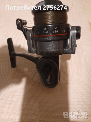 Риболовна макара MITCHELL 1060, снимка 6 - Макари - 53393422