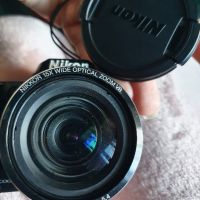 Фотоапарат Nikon coolpix L110 с чанта и зарядно, снимка 5 - Фотоапарати - 45115458
