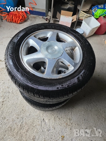 Лети джанти "15" 4х114 с нови гуми 185/65/15 Нисан Nissan, снимка 3 - Гуми и джанти - 52437450