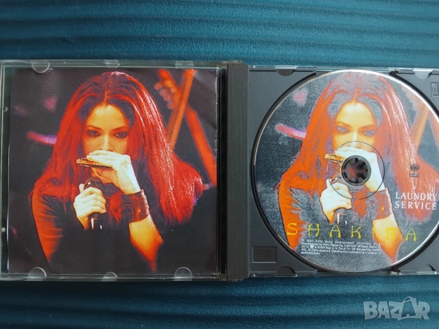 Shakira – Laundry Service - матричен диск музика, снимка 2 - CD дискове - 53758313