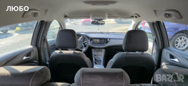 Opel Astra Sports Tourer, снимка 12 - Автомобили и джипове - 52752194