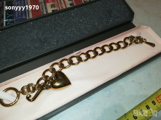 JUICY COTURE GOLD BORN IN USA-ВНОС SWISS 2709251901, снимка 6 - Гривни - 51859359