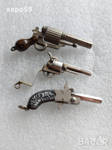 Миниатюрни сребърни пистолети-сребро 900/цена за трите 500 еу.
