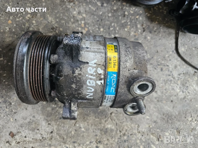 Компресор за климатик Chevrolet Nubira 1.8 715334, снимка 2 - Части - 50934093