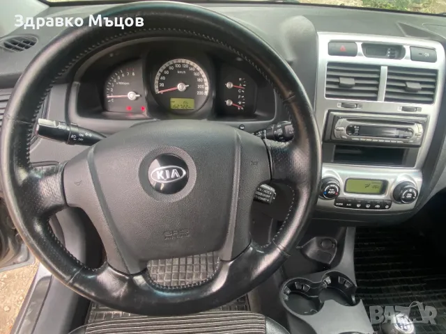 Kia Sportige 2.0i 140 4x4, снимка 10 - Автомобили и джипове - 47326001