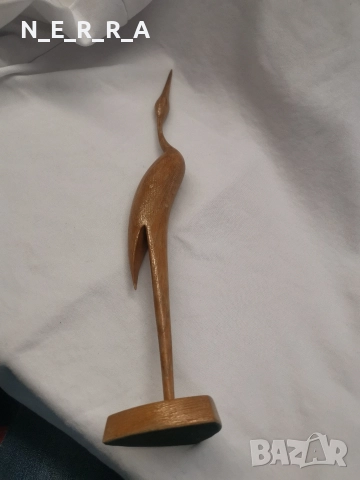 Дървена фигура на птица