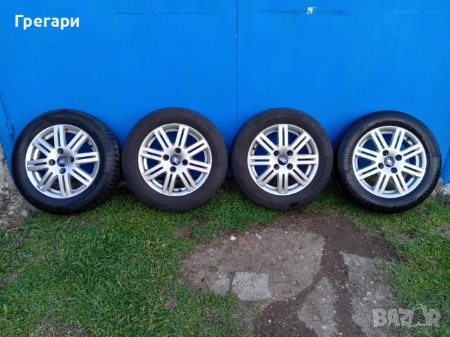 Продавам оригинални джанти с гуми на Ford 195 60 15 в перфектно състояние 