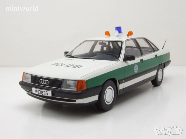 Audi 100 C3 1989 Polizei полицейски - мащаб 1:18 на Triple9 моделът е нов в кутия