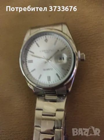 Часовник,масивен,кварцов, ръчен .