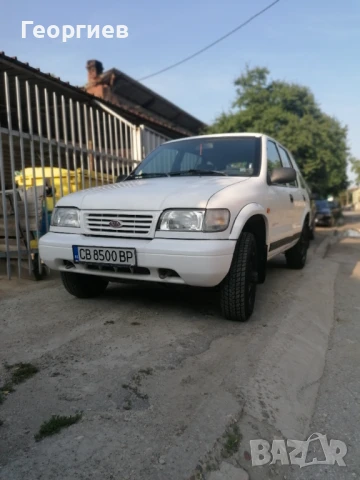 Kia Sportage - 2.0 газ / бензин, снимка 8 - Автомобили и джипове - 50507666