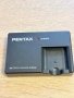  Pentax D-BC63 зарядно, снимка 1