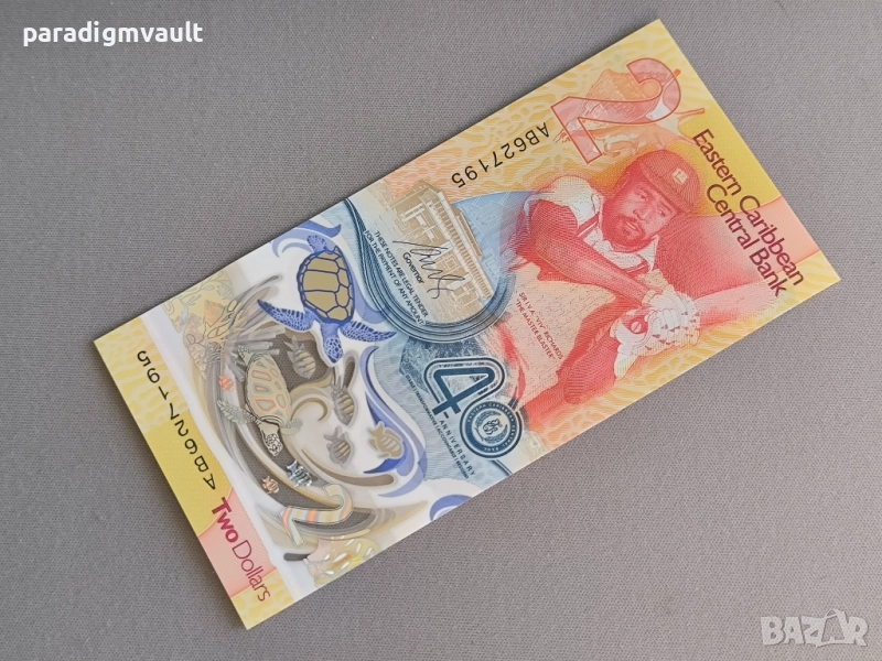 Банкнота - Източни Кариби - 2 долара (юбилейна) UNC | 2023г., снимка 1