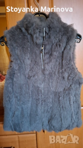 Дамски пухен елек