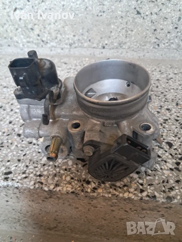 Дроселовата  клапа за Митсубиши Пинин 