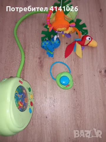 Музикалната въртележка на Fisher Price Rainforest Peek a Boo Leaves, снимка 2 - Музикални играчки - 46998770