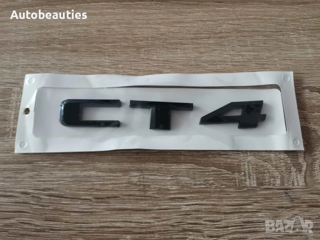 черно лого Cadillac CT4 