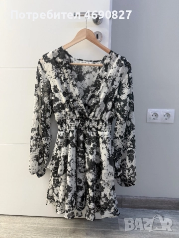 Стилна дамска рокля с V-образно деколте и ластична талия