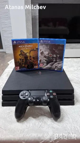 Playstation 4 Pro с джойстик и 2 игри, снимка 1