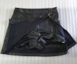 Къса пола от еко кожа с панталонки. Обиколка на талията 82см., снимка 3