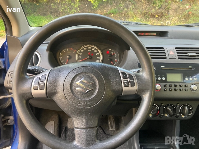 Suzuki Swift 1.5 VVT, снимка 11 - Автомобили и джипове - 52122401