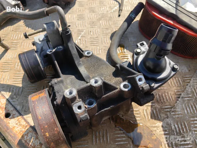 Водна помпа Honda 2.4i бензин тип на мотора K24, снимка 4 - Части - 50308616