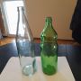 137. Празни стъклени бутилки 1 литър - два вида, подарък 100 броя  нови капачки за бутилките, снимка 1 - Буркани, бутилки и капачки - 45317556