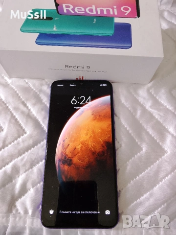 Телефон Xiaomi Redmi 9