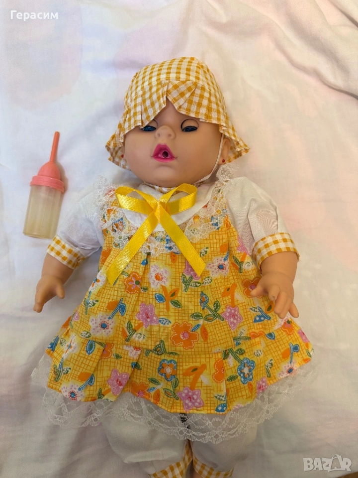 Детска играчка кукла със звук и движения на главата, снимка 1