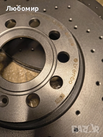 Преден спирачен диск (2 в кутия) перфориран за VW Golf Scirocco Touran Audi A3 (Brembo 0997721X) , снимка 9 - Части - 52006920