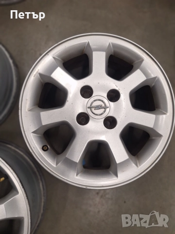 ОРИГИНАЛНИ ЖЕЛЯЗНИ ДЖАНТИ-ОПЕЛ -4Х100Х56.6-15 ЦОЛА, снимка 3 - Гуми и джанти - 52839523