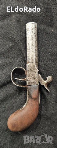 малък капсулен пистолет