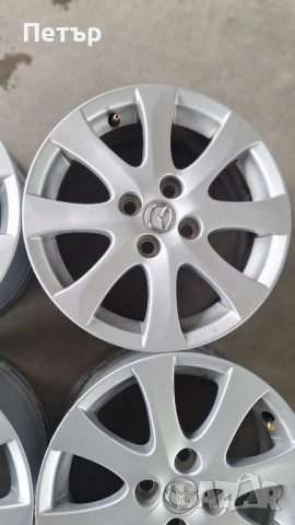 ОРИГИНАЛНИ АЛУМИНИЕВИ ДЖАНТИ ЗА МАЗДА -4Х100Х54-15цола, снимка 3 - Гуми и джанти - 53632405
