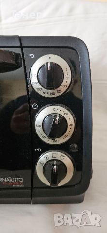 Фурна DeLonghi 1400W 14литра, снимка 3 - Печки, фурни - 45640440