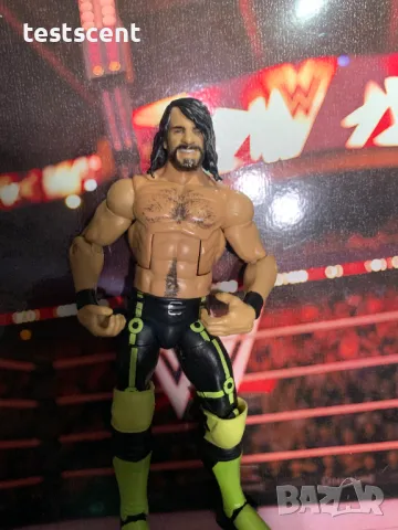 Екшън фигура WWE Seth Rollins Сет Ролинс Mattel Elite figure играчка neon yellow & black, снимка 5 - Колекции - 49152214