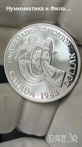 Сребърна монета Канада 1 долар 1983 година, снимка 2 - Нумизматика и бонистика - 52707377