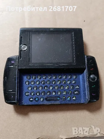 телефон Моторола Q700