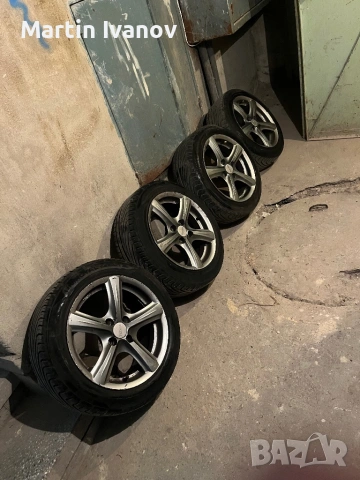 Алуминиеви джанти toora 15 4/100 с гуми uniroyal, снимка 4 - Гуми и джанти - 53008138