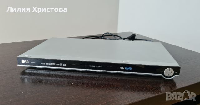 LG DVD Player DVX 9900, снимка 1 - Плейъри, домашно кино, прожектори - 45429692