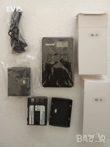 Универсално зарядно SEIWEI® + 2 батерии NB-2L (7.4V, 1200mAh, Li-ion), снимка 1