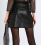 Къса кожена пола със сребристи капси, снимка 2