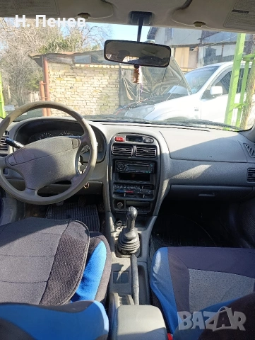 Suzuki Baleno 1.6i 4x4, снимка 10 - Автомобили и джипове - 53479352