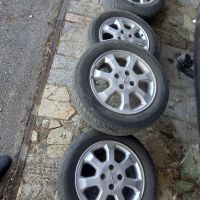 4 броя гуми с джанти , снимка 2 - Гуми и джанти - 45162773