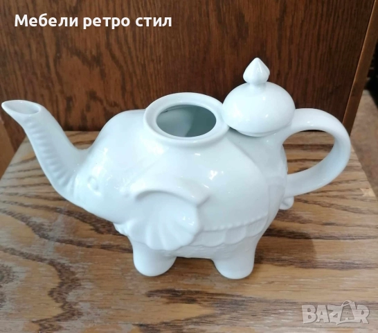 Чайник от бял порцелан, изработен във формата на щастливо слонче с вдигнат хобот и релефни детайли. , снимка 9 - Декорация за дома - 52007567