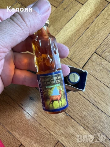 Три шишенца ликьор