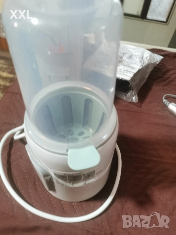 Уред за затопляне на бебешка храна , снимка 4 - Прибори, съдове, шишета и биберони - 52165224