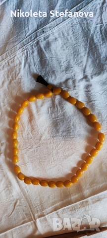 Истинска кехлибарена броеница от 33 броя мъниста със поп.