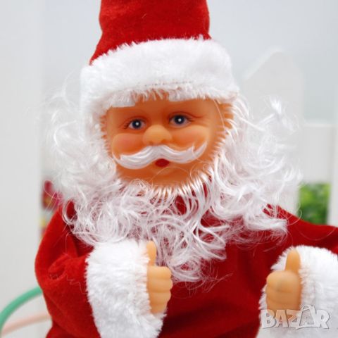 Музикален Дядо Коледа, въртящ обръчи, 30см, снимка 6 - Музикални играчки - 46434251