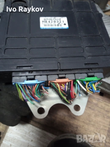  Моторен компютър Mitsubishi Carisma (1995-2004г.) MR420321, снимка 2 - Части - 53915669