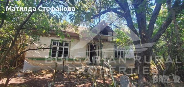 Евтин селски имот с голям  потенциал в село Николаевка, снимка 1